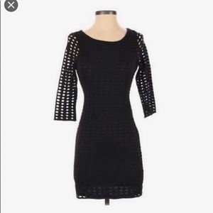 Black 3/4 sleeve fitted mini dress. Size S.